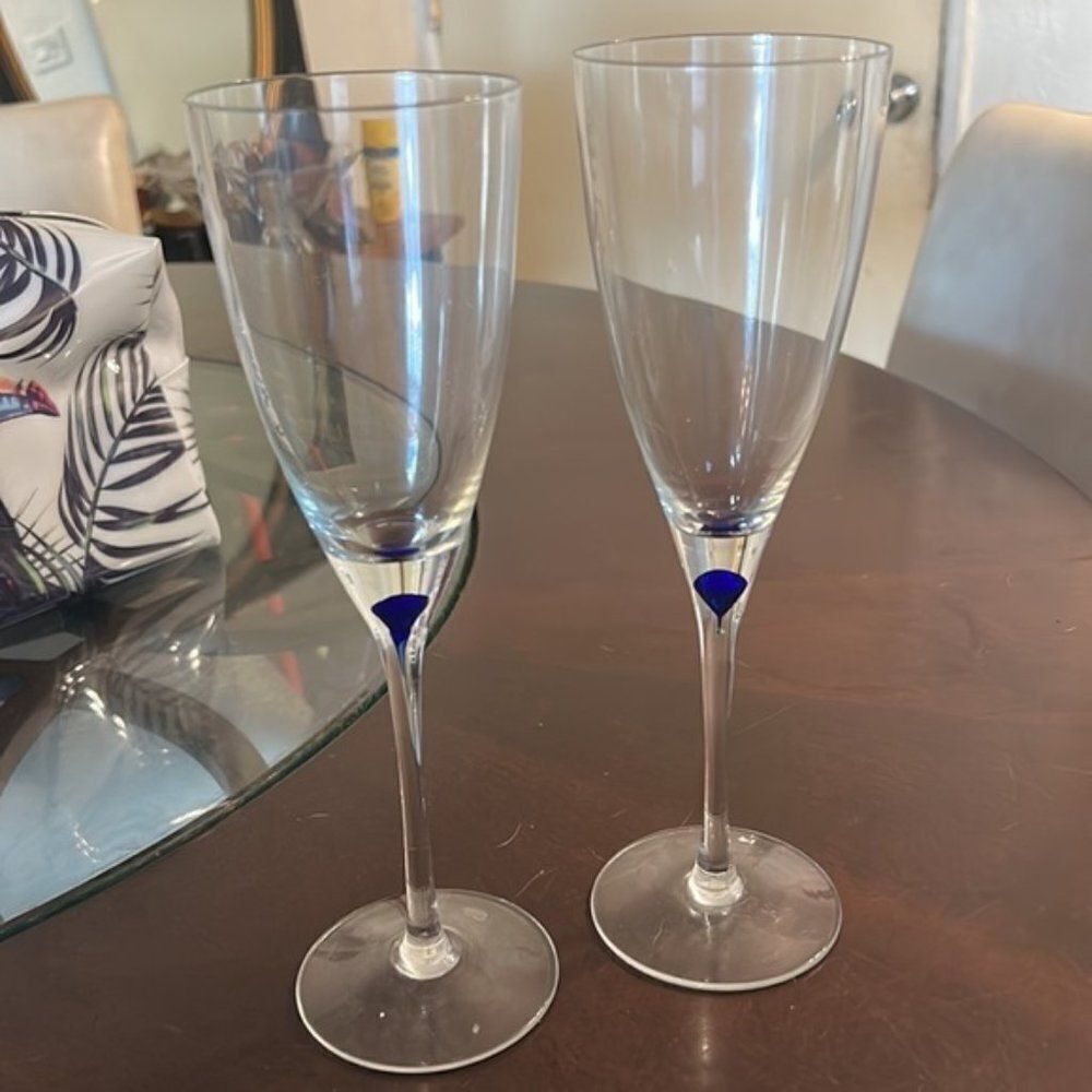 Crystal wine glasses with a  sapphire blue in stem.